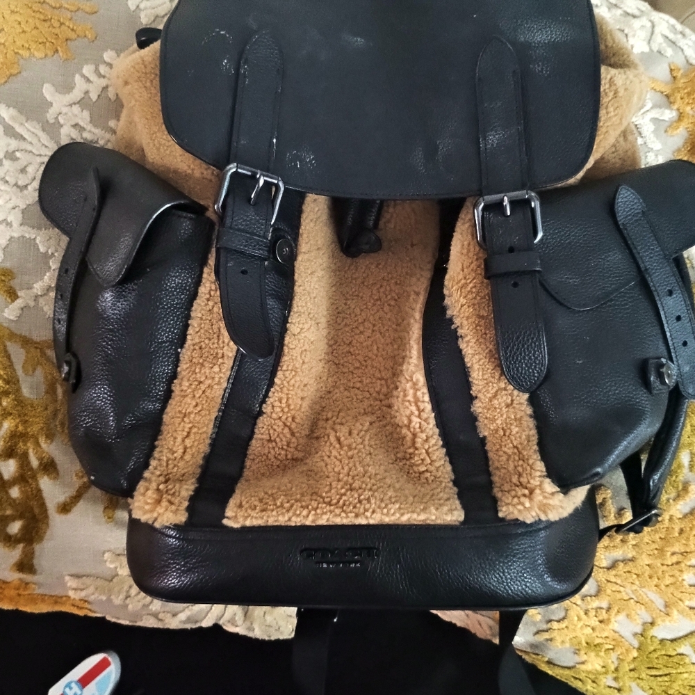 Leather and shearling coach backpack